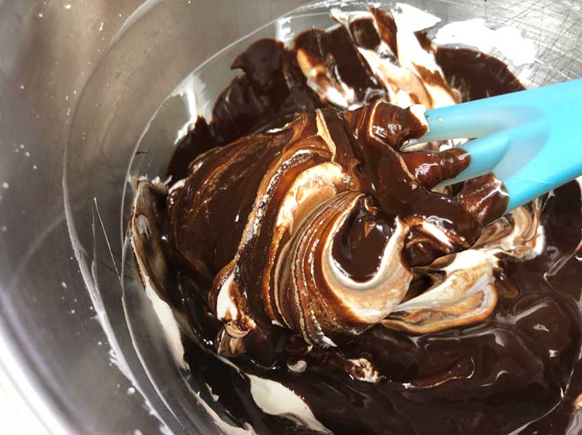 Fold the melted chocolate into the whipped topping.